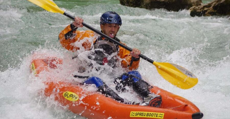 Bovec: Half-Day Kayaking Trip Down the Soča - The longer section with rocks, waves, and rapids
