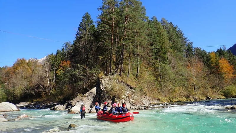 From Bovec: Premium Rafting on Soča River with Photo Service - The raft slide, swimming, and optional rock jumps