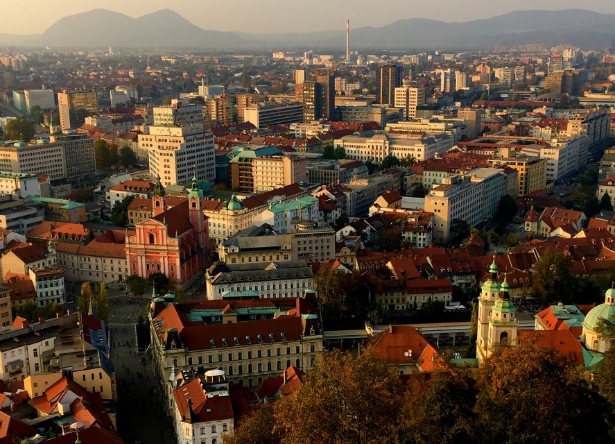Ljubljana and Ljubljana Castle Sightseeing Tour - Crossing the Ljubljanica at Cobblers’ Bridge
