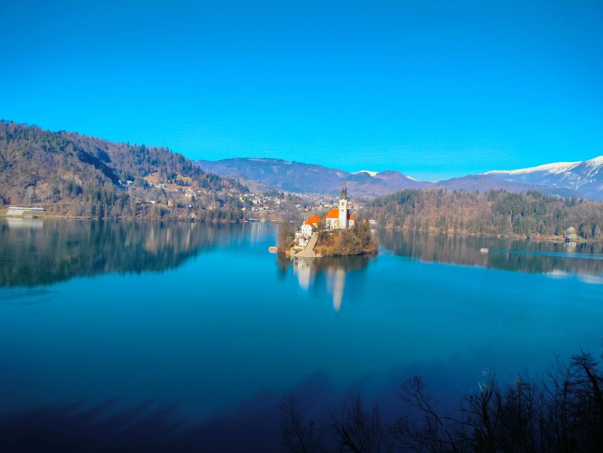 Postojna cave and bled lake day tour from Ljubljana - Lake Bled: viewpoint, island boat, and cream cake