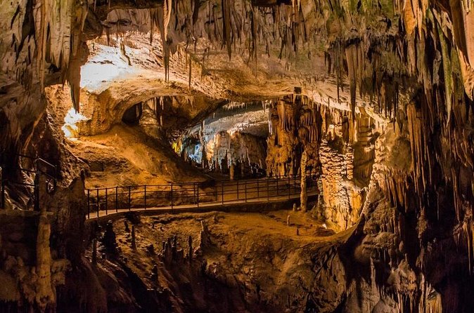Postojna Cave and Predjama Castle Trip including entry tickets - Predjama Castle beneath the rock arch
